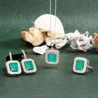 Göz kamaştırıcı okyanus yeşili paraiba taşlı baget pırlanta gümüş set